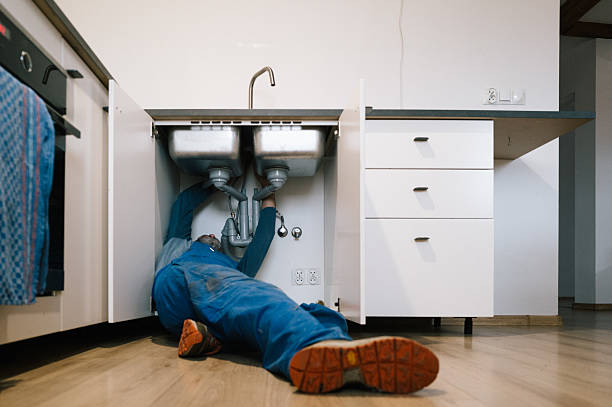 Professional Plumbing technician working in Lilly, PA